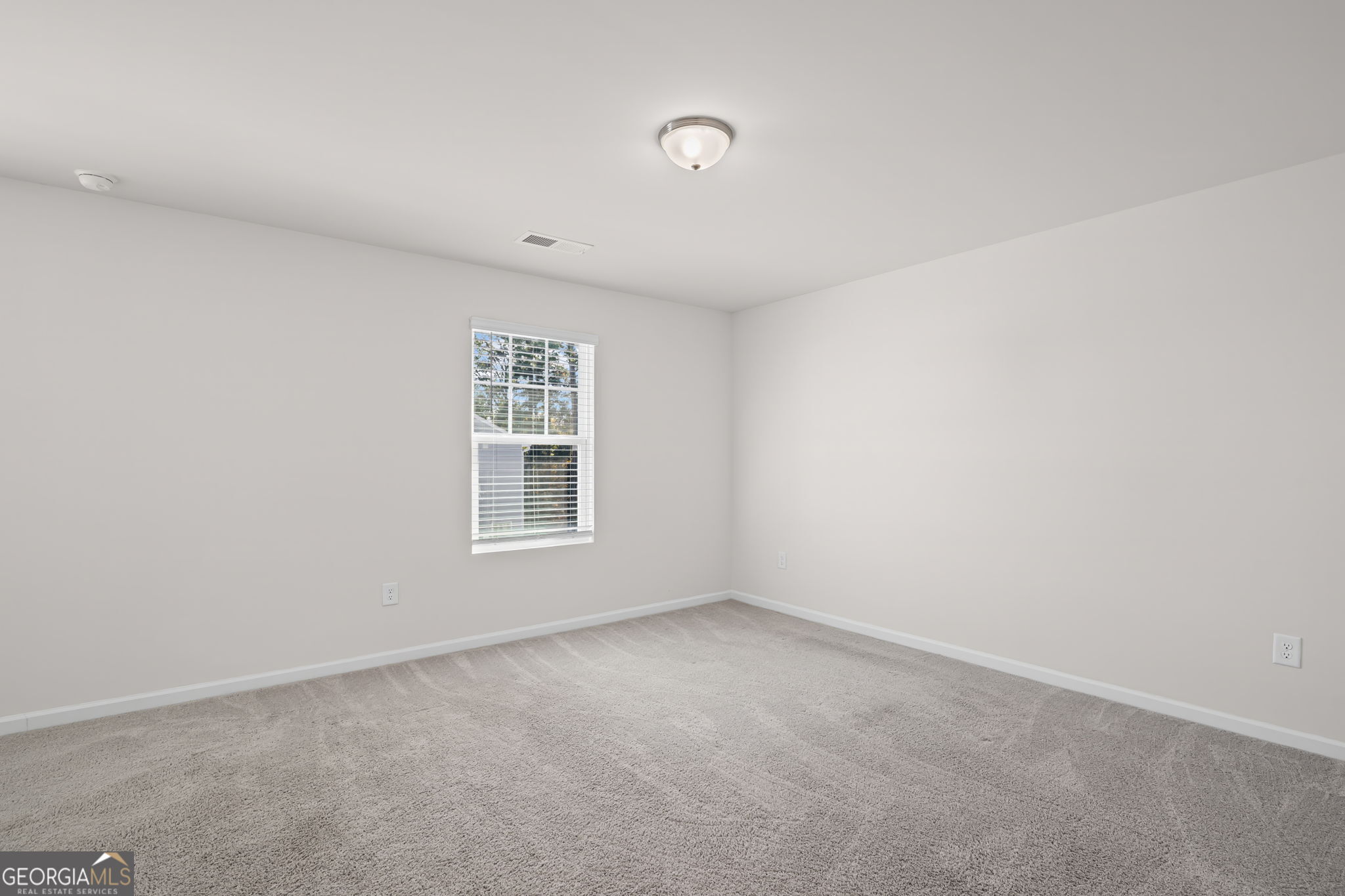 406 Kings Cross Way Cartersville, GA 30120 - Photo 22 of 28 a view of an empty room with a window