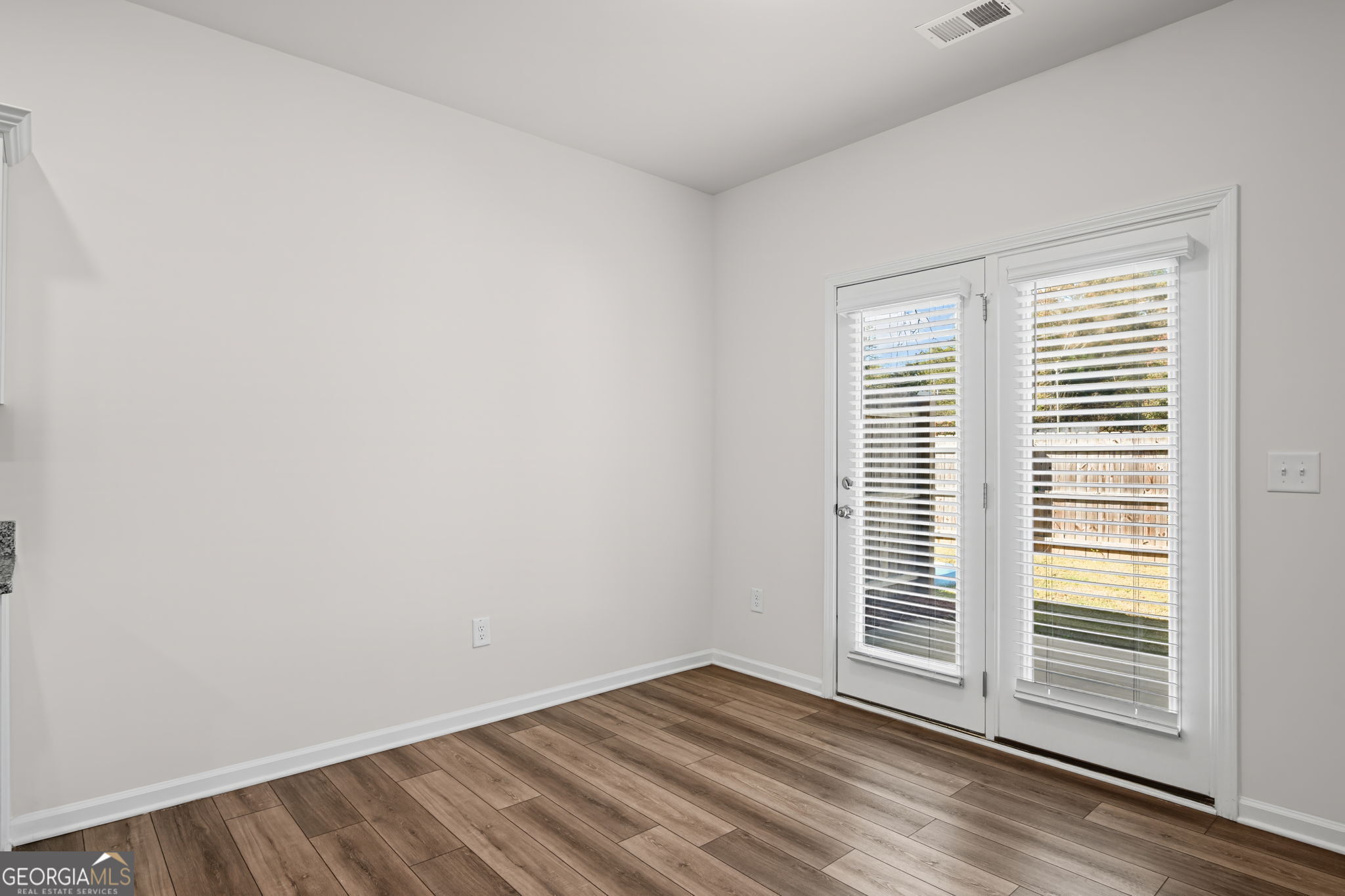406 Kings Cross Way Cartersville, GA 30120 - Photo 9 of 28 a view of a room that has a window in it
