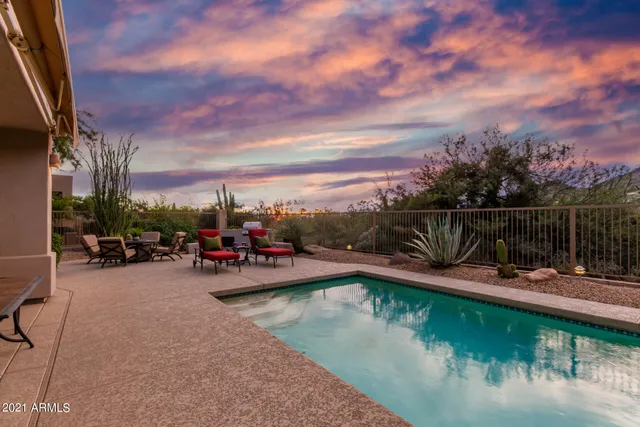a view of a lake with a house