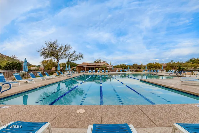a view of residential houses with outdoor space