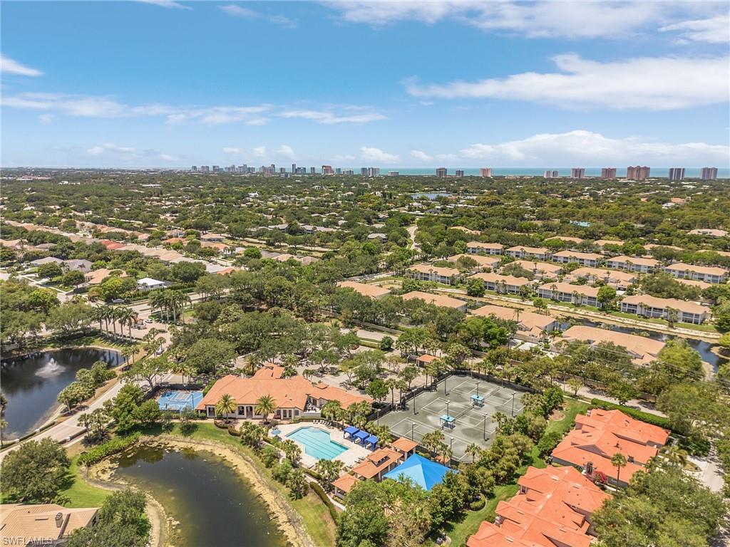 7596 San Miguel Way Naples, FL 34109 - Photo 33 of 34 a view of lake and city