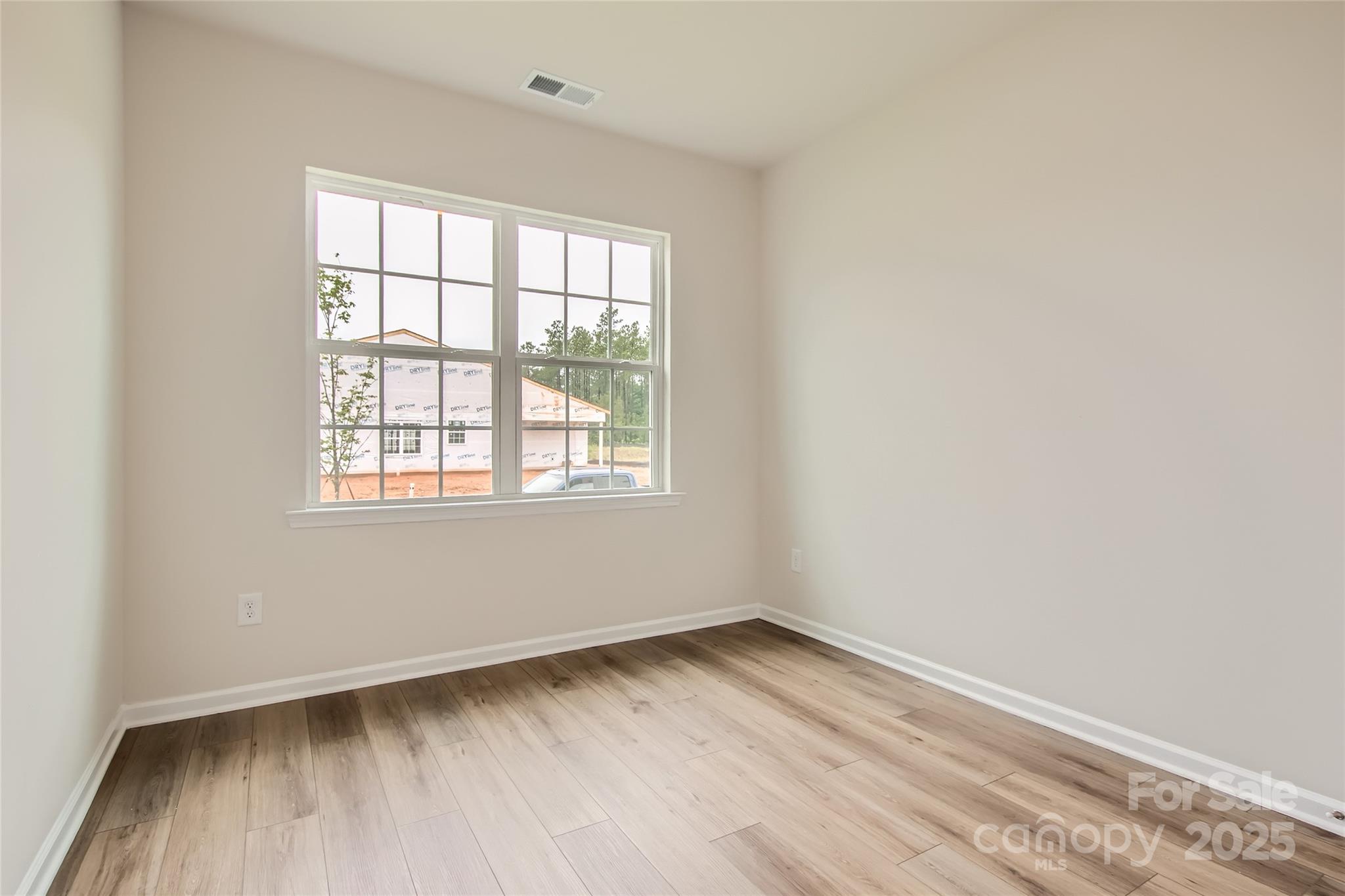 8454 Norman Frst Road Lancaster, SC 29720 - Photo 11 of 16 an empty room with a window