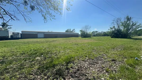 a view of an outdoor space and a yard
