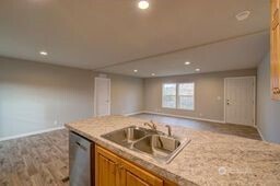 1331 Dolan Street Raymond, WA 98577 - Photo 13 of 32 a kitchen with a sink and cabinets