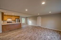 1331 Dolan Street Raymond, WA 98577 - Photo 17 of 32 a large kitchen with a sink and a large window
