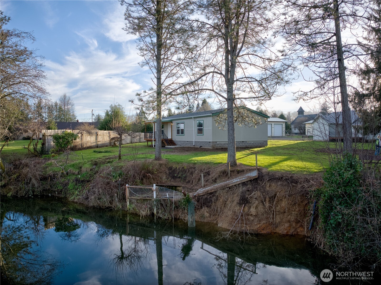 1331 Dolan Street Raymond, WA 98577 - Photo 2 of 32 a view of a park with iron fence