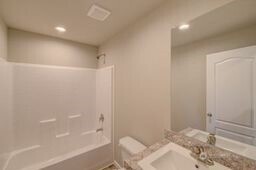 1331 Dolan Street Raymond, WA 98577 - Photo 22 of 32 a bathroom with a bathtub and shower