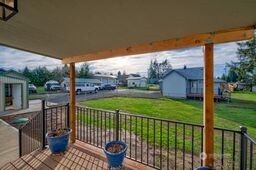 1331 Dolan Street Raymond, WA 98577 - Photo 8 of 32 a view of a porch with a yard