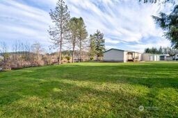 1331 Dolan Street Raymond, WA 98577 - Photo 10 of 32 a view of building with garden