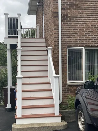 a view of house with outdoor space and porch
