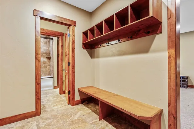 a view of an entryway with wooden floor
