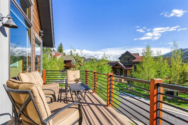 a view of balcony with furniture