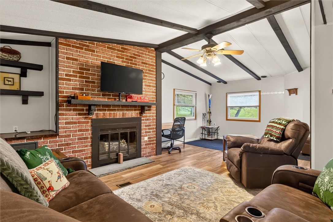 7213 Tilton Road Bristol, NY 14469 - Photo 8 of 50 Inviting Living Room with Brick Fireplace