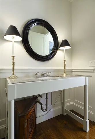 a spacious bedroom with a bed and furniture