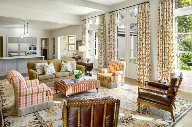 a living room with furniture and a table