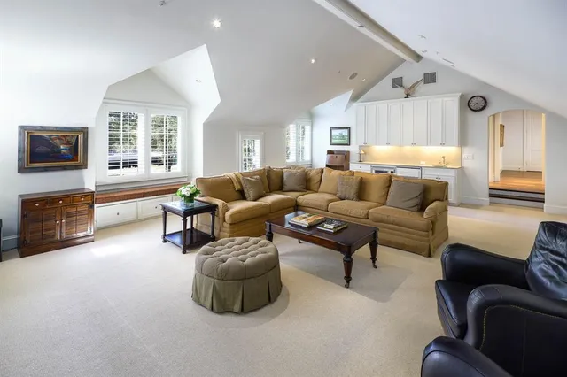 an aerial view of a house with outdoor space pool seating area and yard