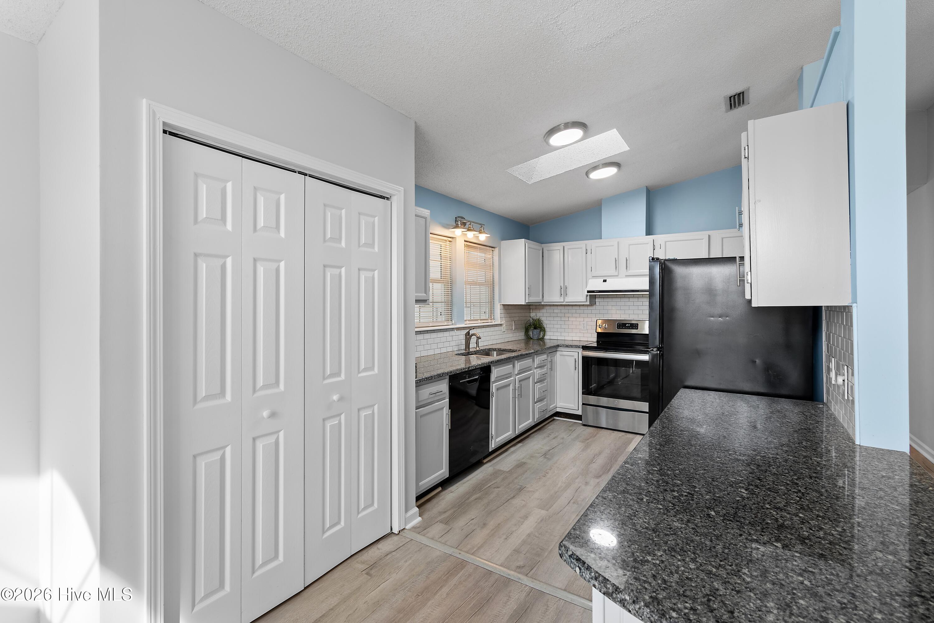 533 Leeward Way Calabash, NC 28467 - Photo 11 of 34 Large Pantry and lots of counter space