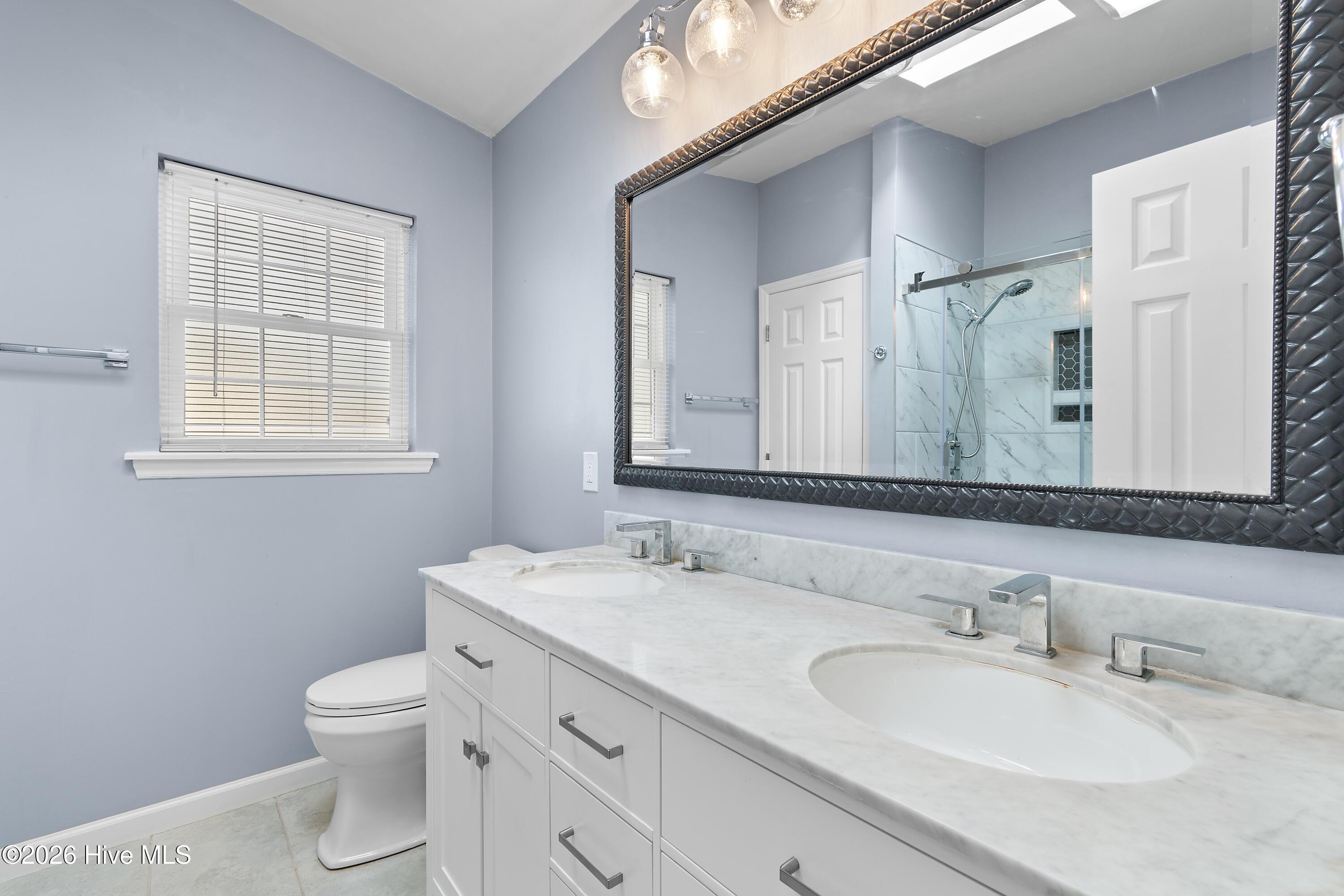 533 Leeward Way Calabash, NC 28467 - Photo 20 of 34 Master bathroom