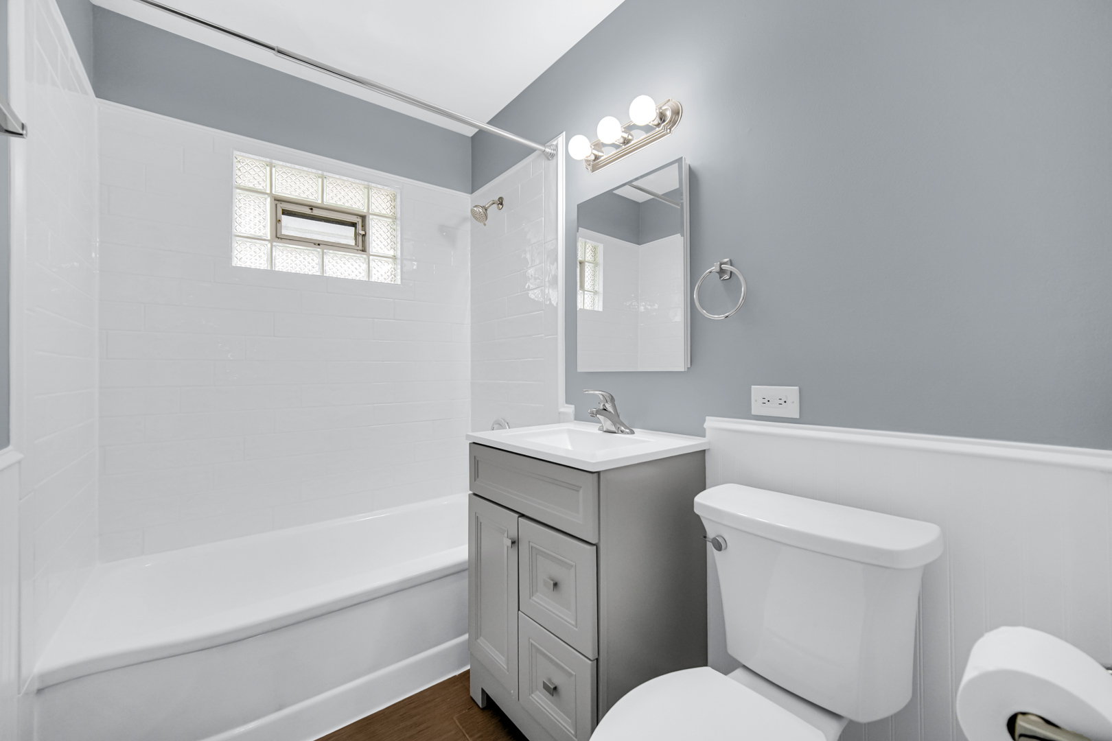 1522 186th Street Homewood, IL 60430 - Photo 19 of 22 a bathroom with a toilet sink and mirror