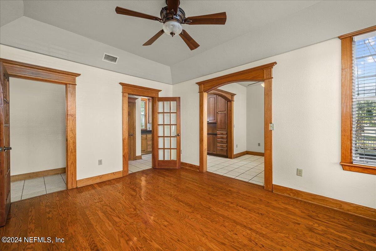 1954 Hubbard Street Jacksonville, FL 32206 - Photo 12 of 30 a view of an empty room with wooden floor and a window