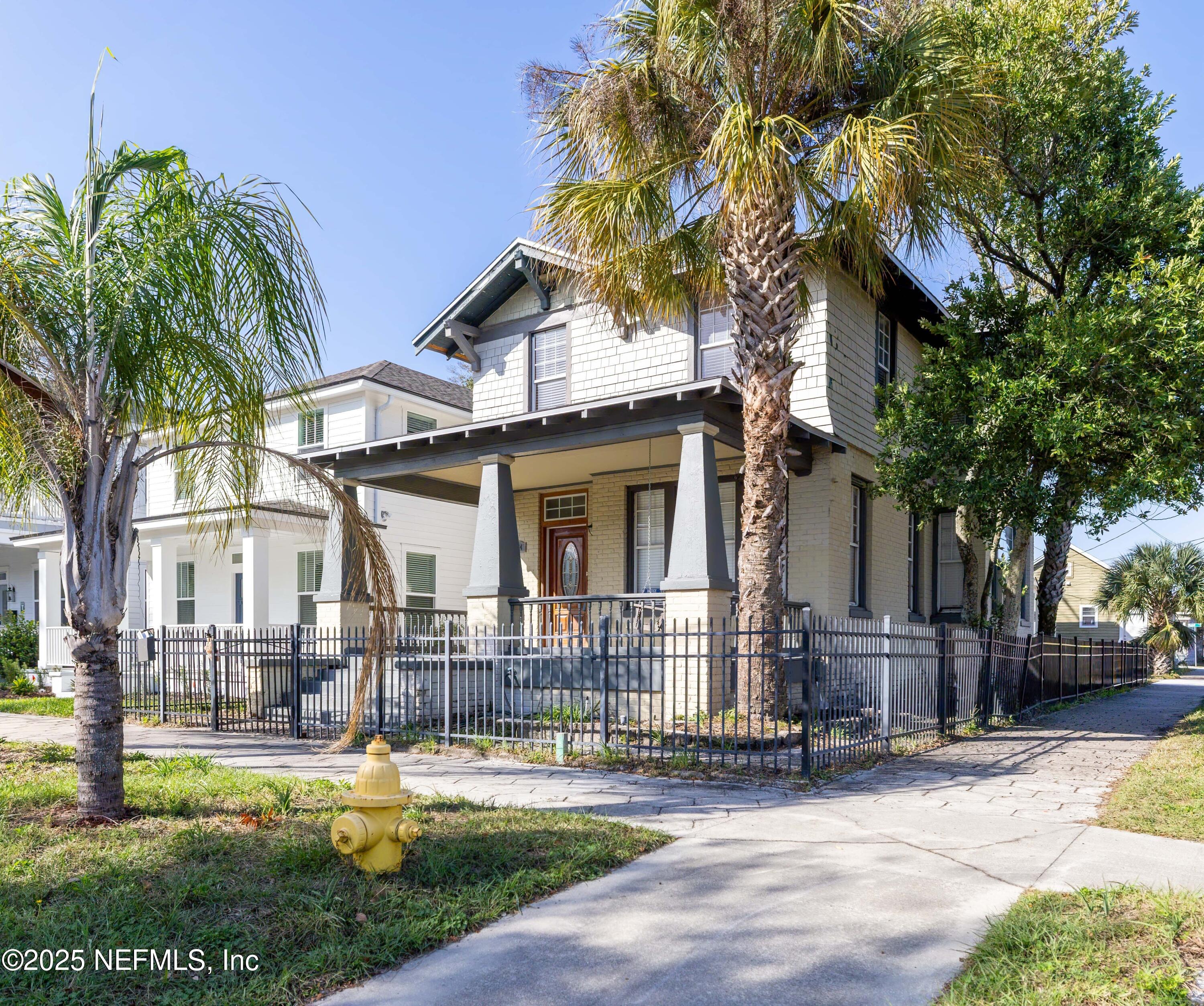 1954 Hubbard Street Jacksonville, FL 32206 - Photo 2 of 30 a front view of a house with swimming pool and sitting area