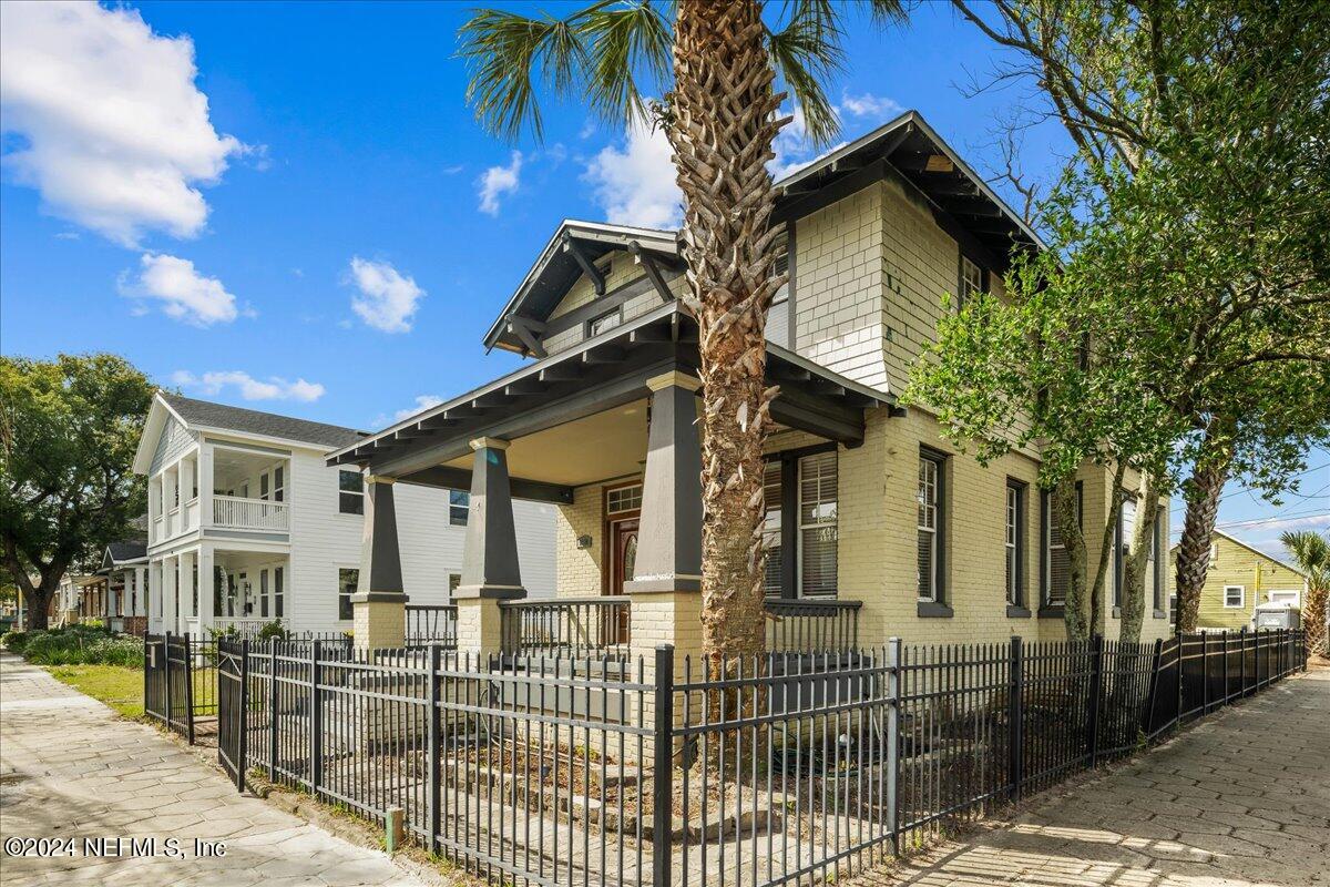 1954 Hubbard Street Jacksonville, FL 32206 - Photo 5 of 30 a view of a house with a small yard and wooden fence