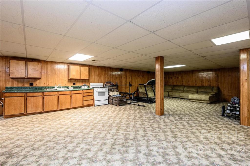 6265 Oxford School Road Claremont, NC 28610 - Photo 20 of 30 a kitchen with lots of counter top space and appliances