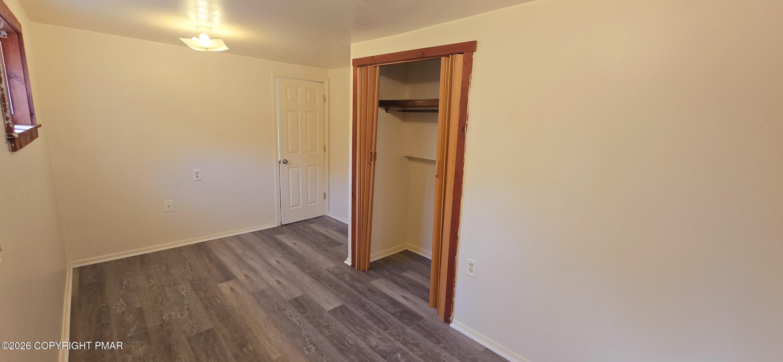 337 Copper Road East Stroudsburg, PA 18302 - Photo 4 of 4 a view of a hallway with wooden floor
