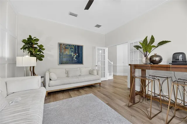 a kitchen with a refrigerator sink and cabinets