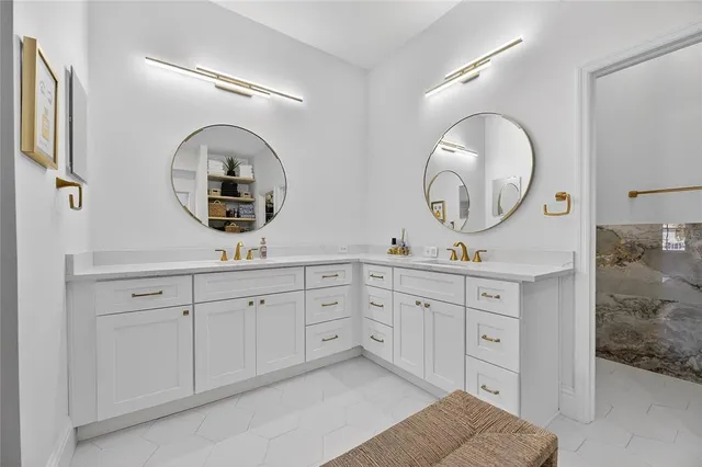 an aerial view of a house with a garden and lake view