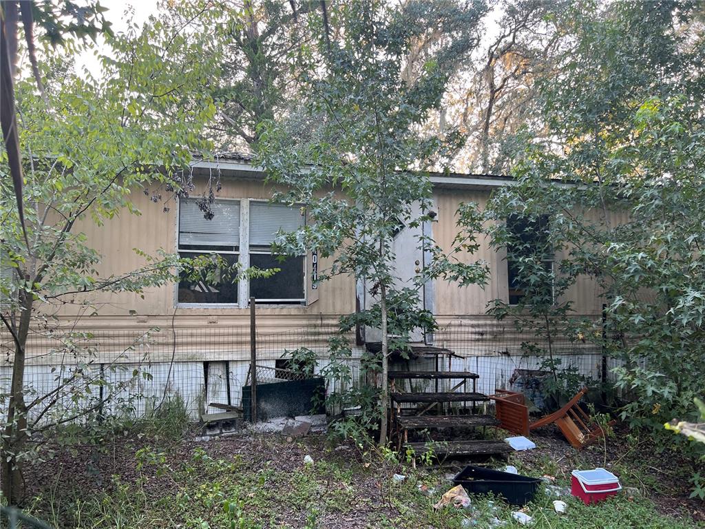 40415 Holly Branch Road Eustis, FL 32736 - Photo 1 of 1 1984 Manufactured Fixer Upper or Demo