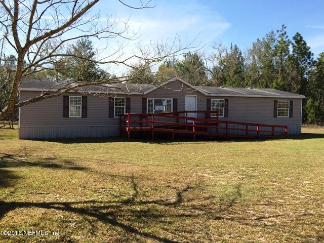 7820 Ranchette Road Keystone Heights, FL 32656 - Photo 1 of 19 a house view with a outdoor space