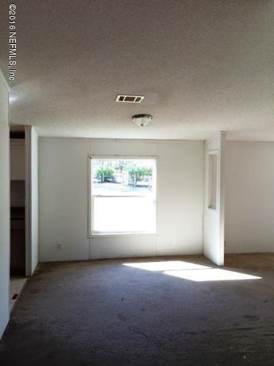 7820 Ranchette Road Keystone Heights, FL 32656 - Photo 4 of 19 an empty room with a window