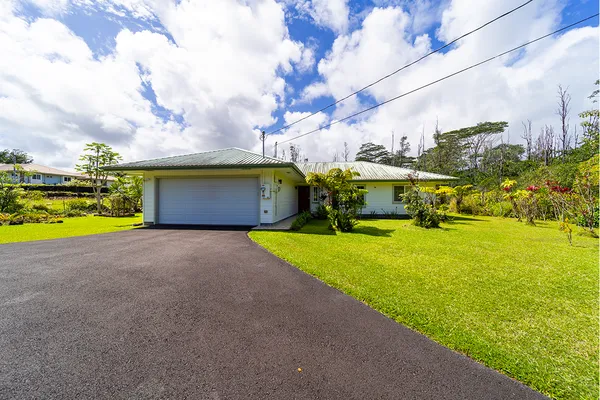a view of a swimming pool with lounge chair