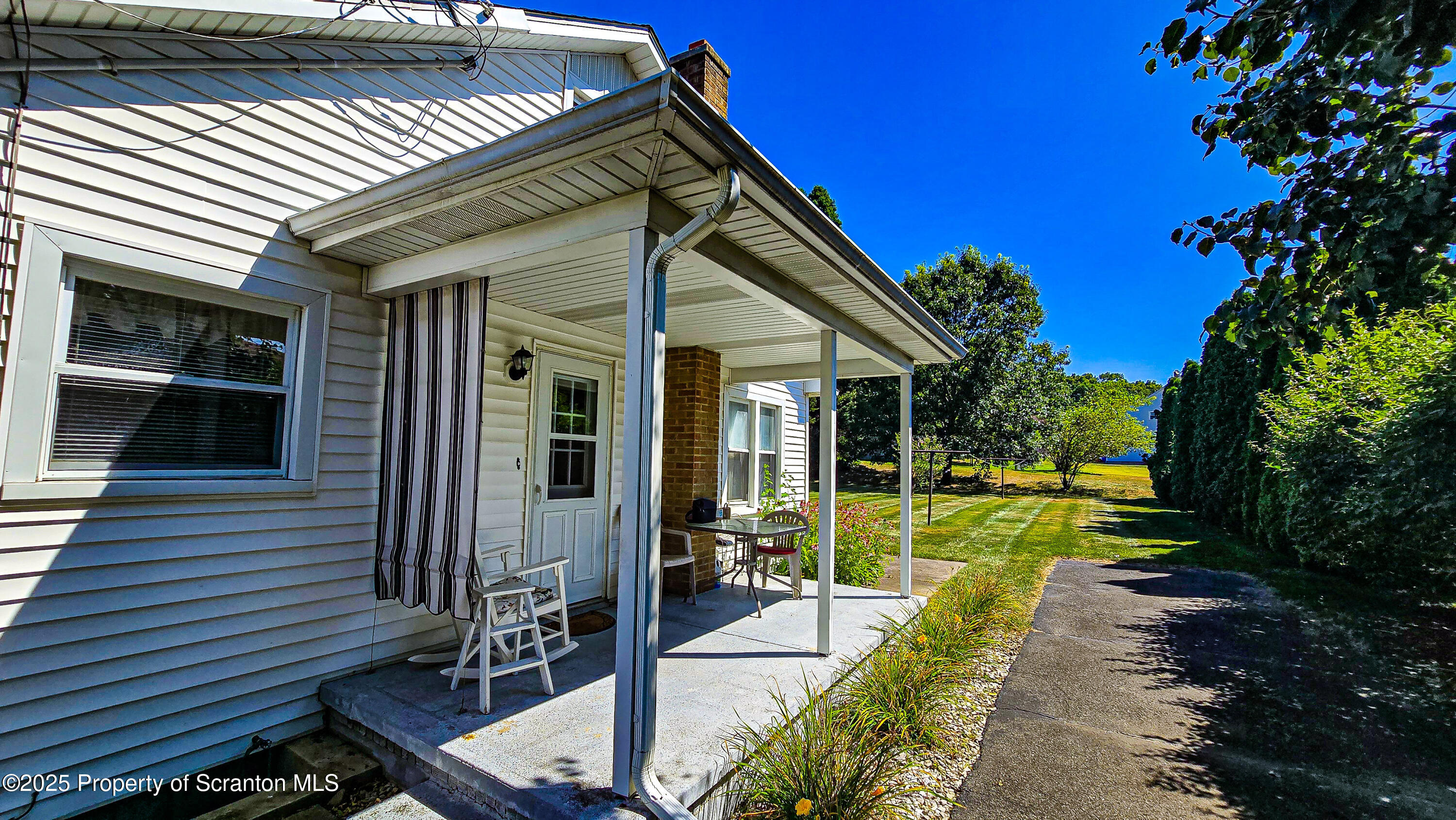 205 Carter Street Old Forge, PA 18518 - Photo 3 of 25 a view of a house with backyard