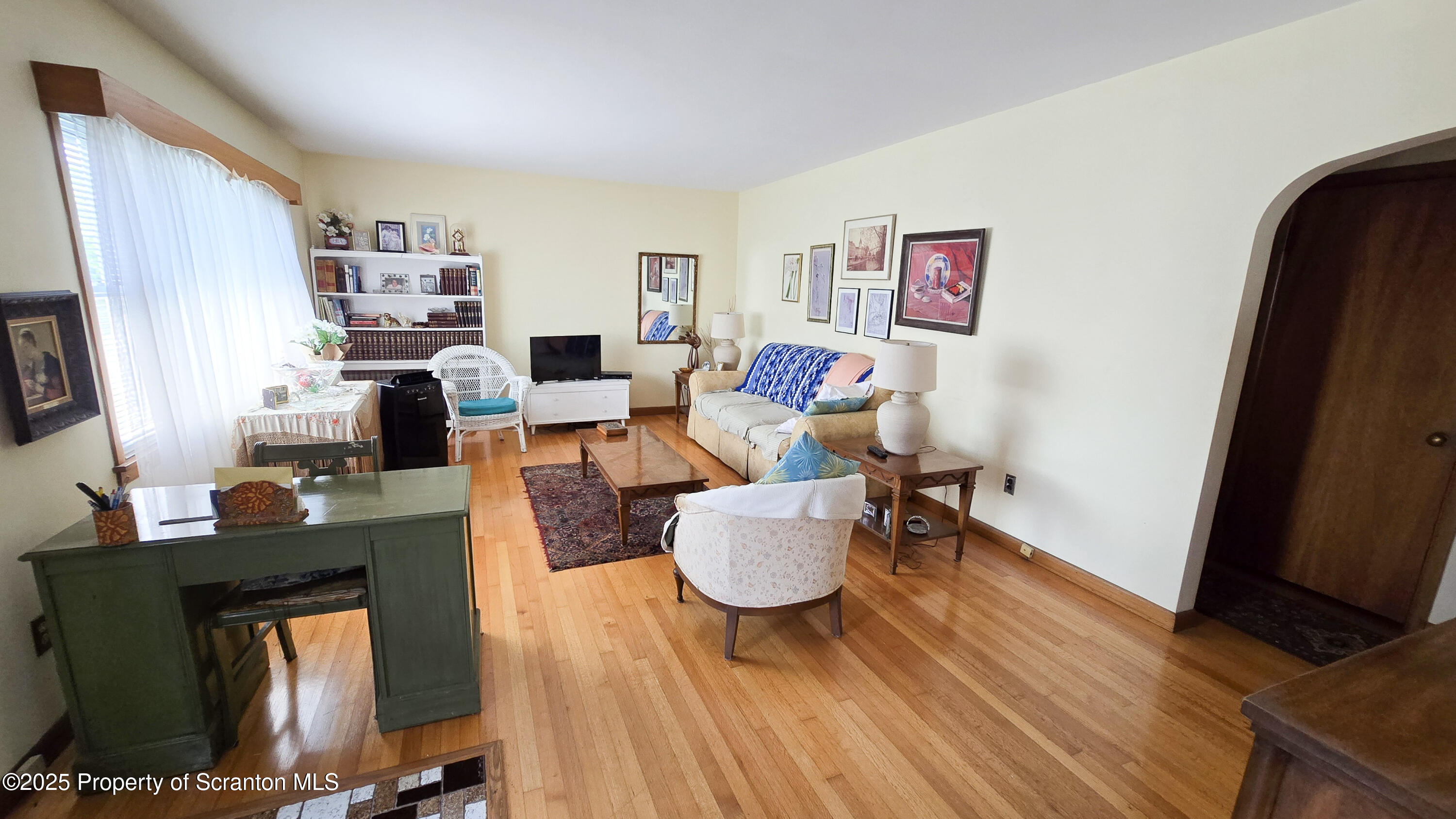 205 Carter Street Old Forge, PA 18518 - Photo 5 of 25 a living room with furniture and a flat screen tv