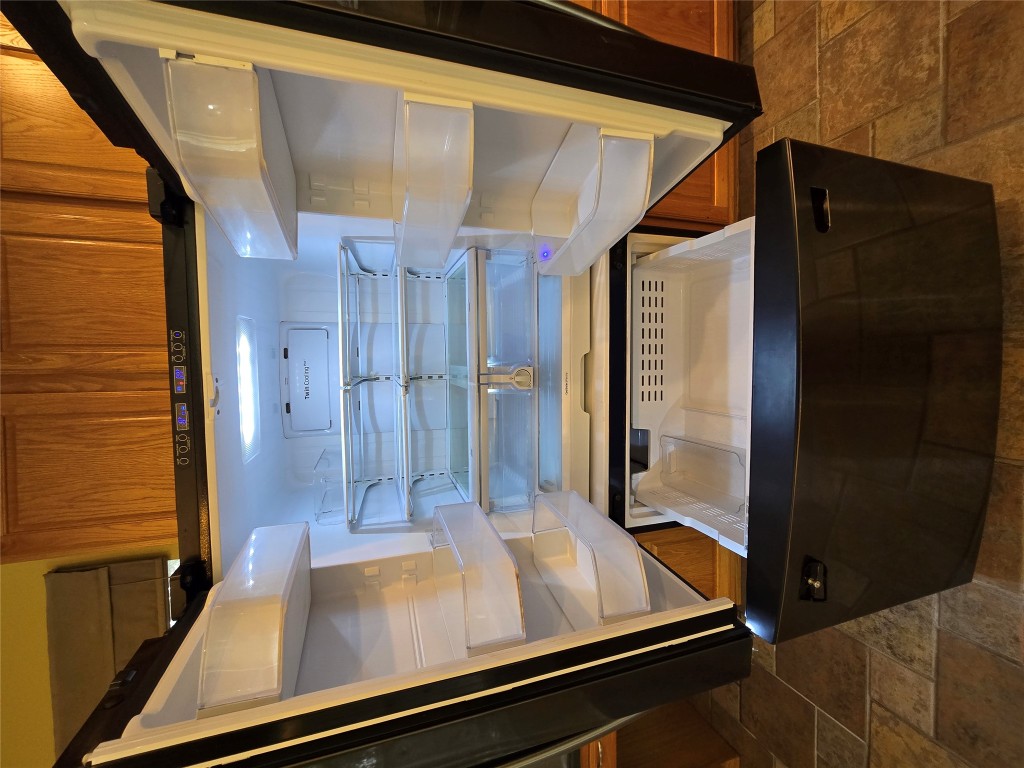 2216 Shark Loop Round Rock, TX 78664 - Photo 25 of 27 a stove top oven sitting inside of a kitchen