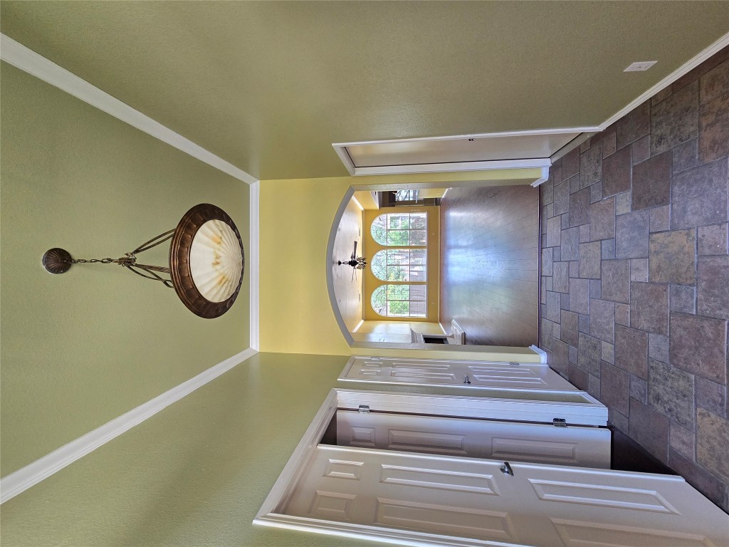 2216 Shark Loop Round Rock, TX 78664 - Photo 4 of 27 a view of a hallway with wooden floor