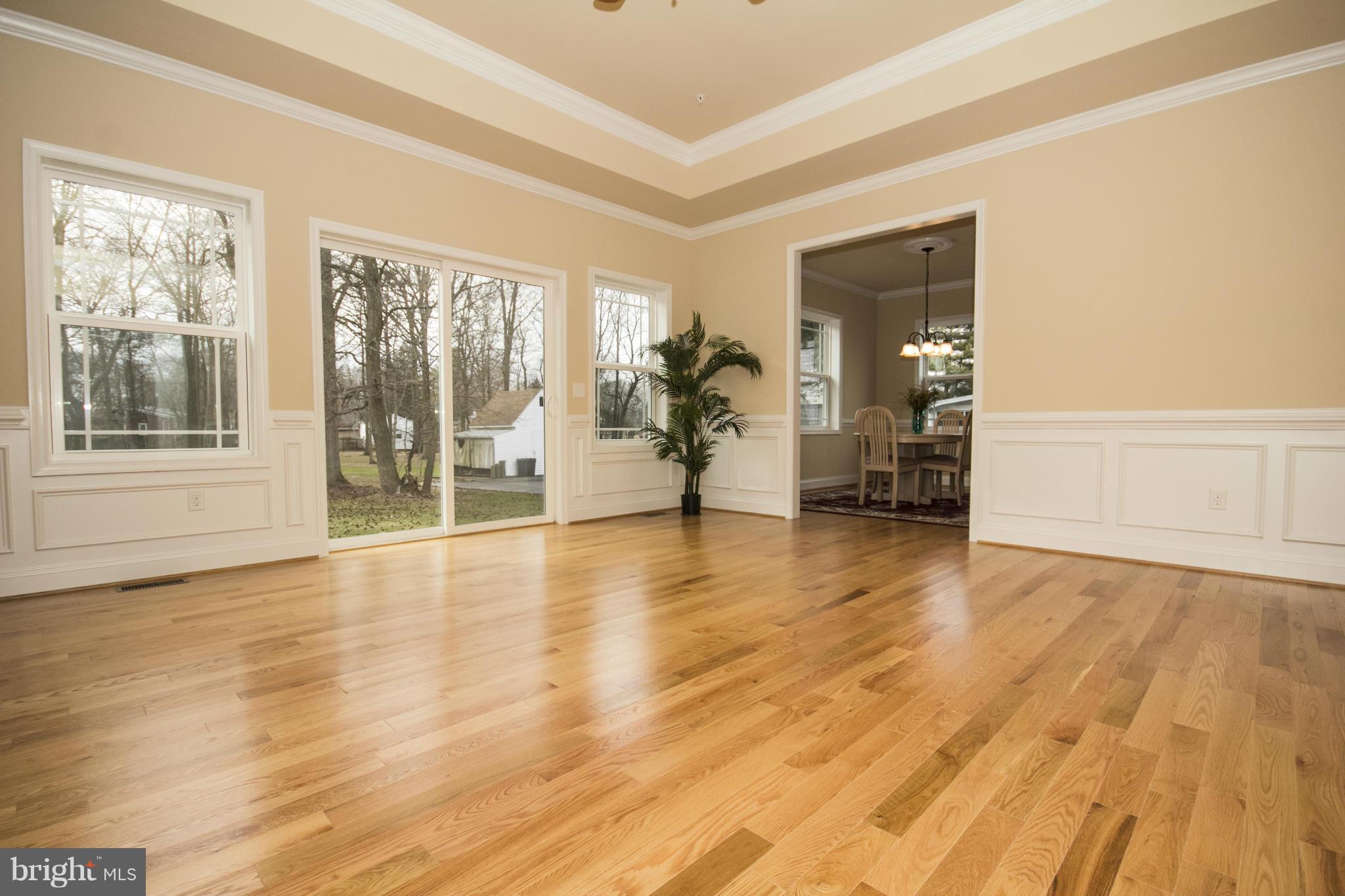 254 Nanticoke Road Baltimore, MD 21221 - Photo 3 of 30 a view of a livingroom with wooden floor