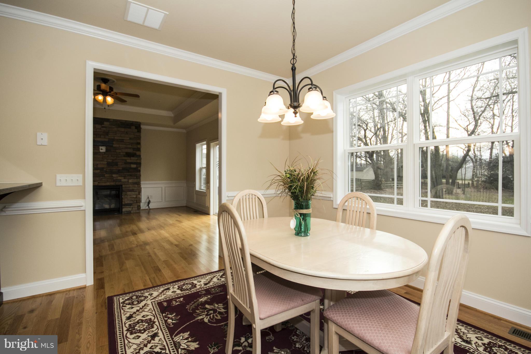 254 Nanticoke Road Baltimore, MD 21221 - Photo 9 of 30 a view of a dining room with furniture window and outside view