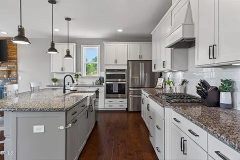 $715,000 | 4900 Sunset Stream Drive, Fuquay-Varina, NC 27526