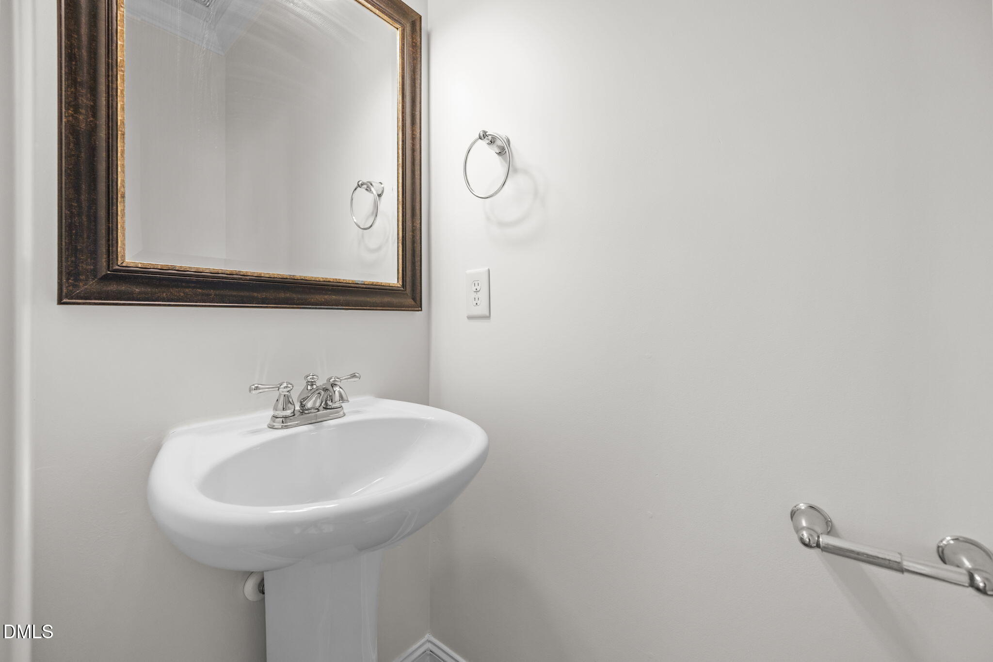 336 Plott Hound Lane Wake Forest, NC 27587 - Photo 18 of 39 a bathroom with a sink and a mirror
