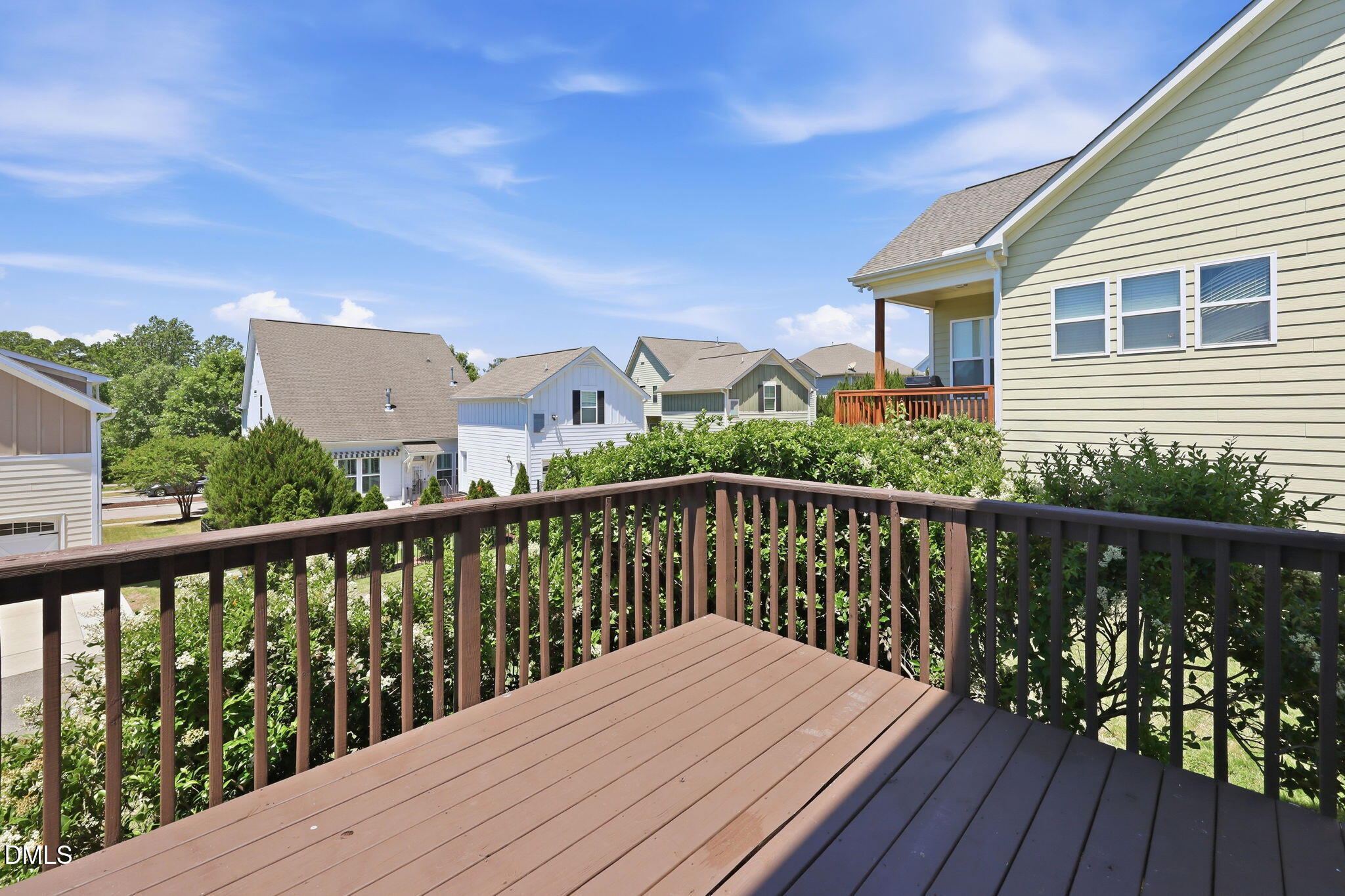336 Plott Hound Lane Wake Forest, NC 27587 - Photo 31 of 39 a balcony with wooden floor and city view