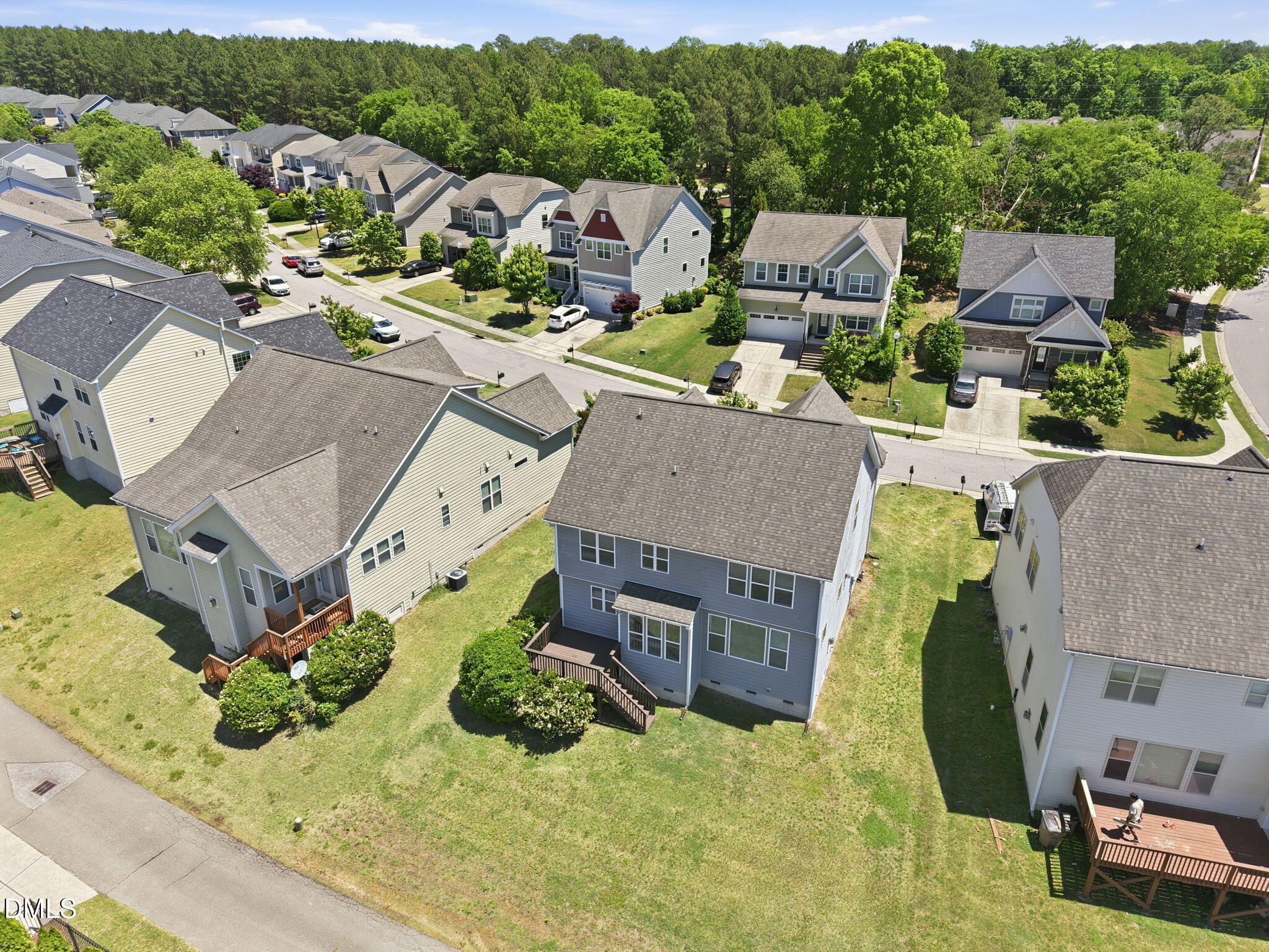 336 Plott Hound Lane Wake Forest, NC 27587 - Photo 38 of 39 an aerial view of a house with a swimming pool