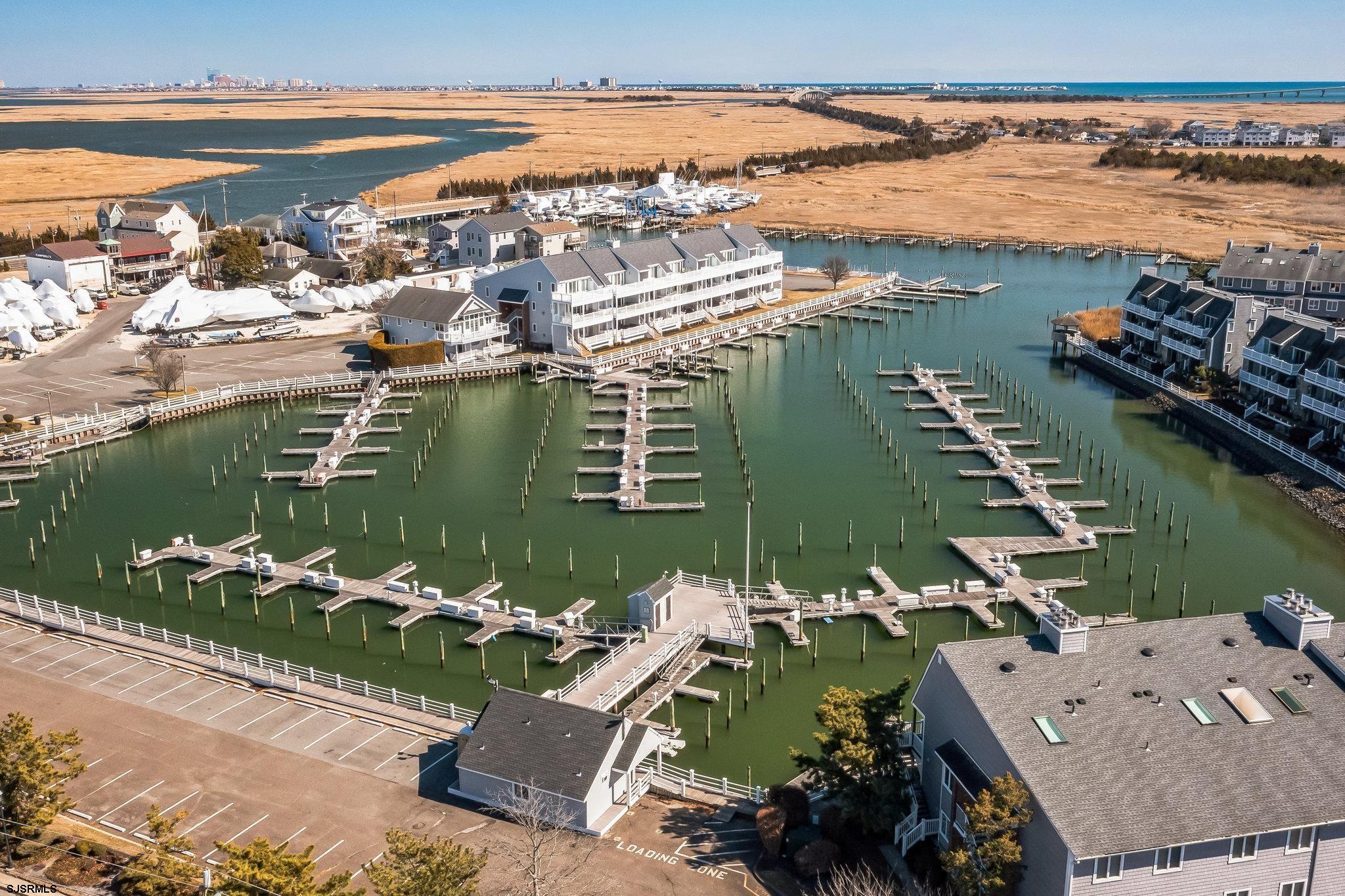 308 Harbour Cove, Unit 308 Somers Point, NJ 08244 - Photo 16 of 16 an aerial view of a house with a lake view