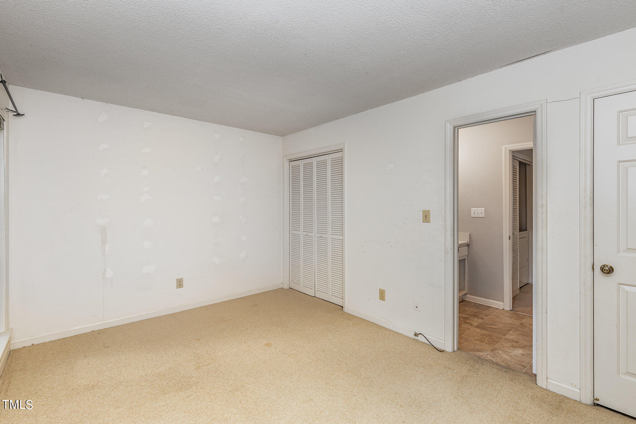 4631 Timbermill Court, Unit 303 Raleigh, NC 27612 - Photo 12 of 15 a view of an empty room