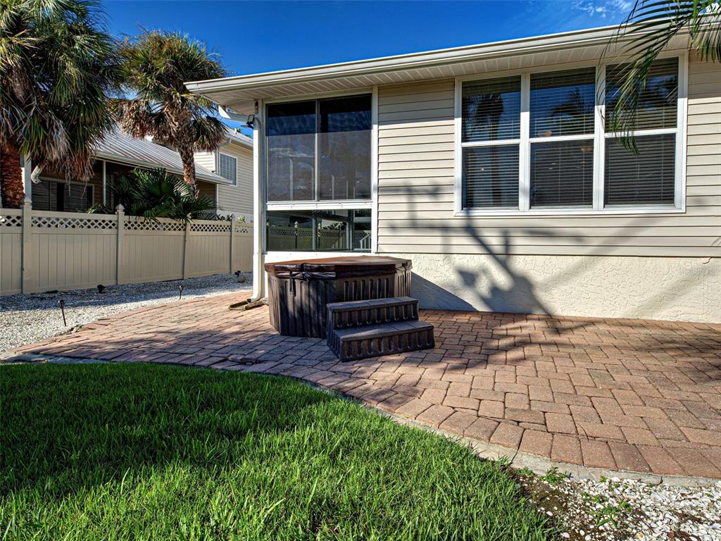 1801 Highland Road Osprey, FL 34229 - Photo 33 of 40 a view of a house with backyard and sitting area