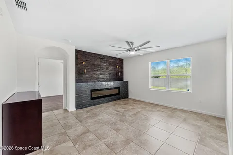 a large bathroom with a large tub and sink