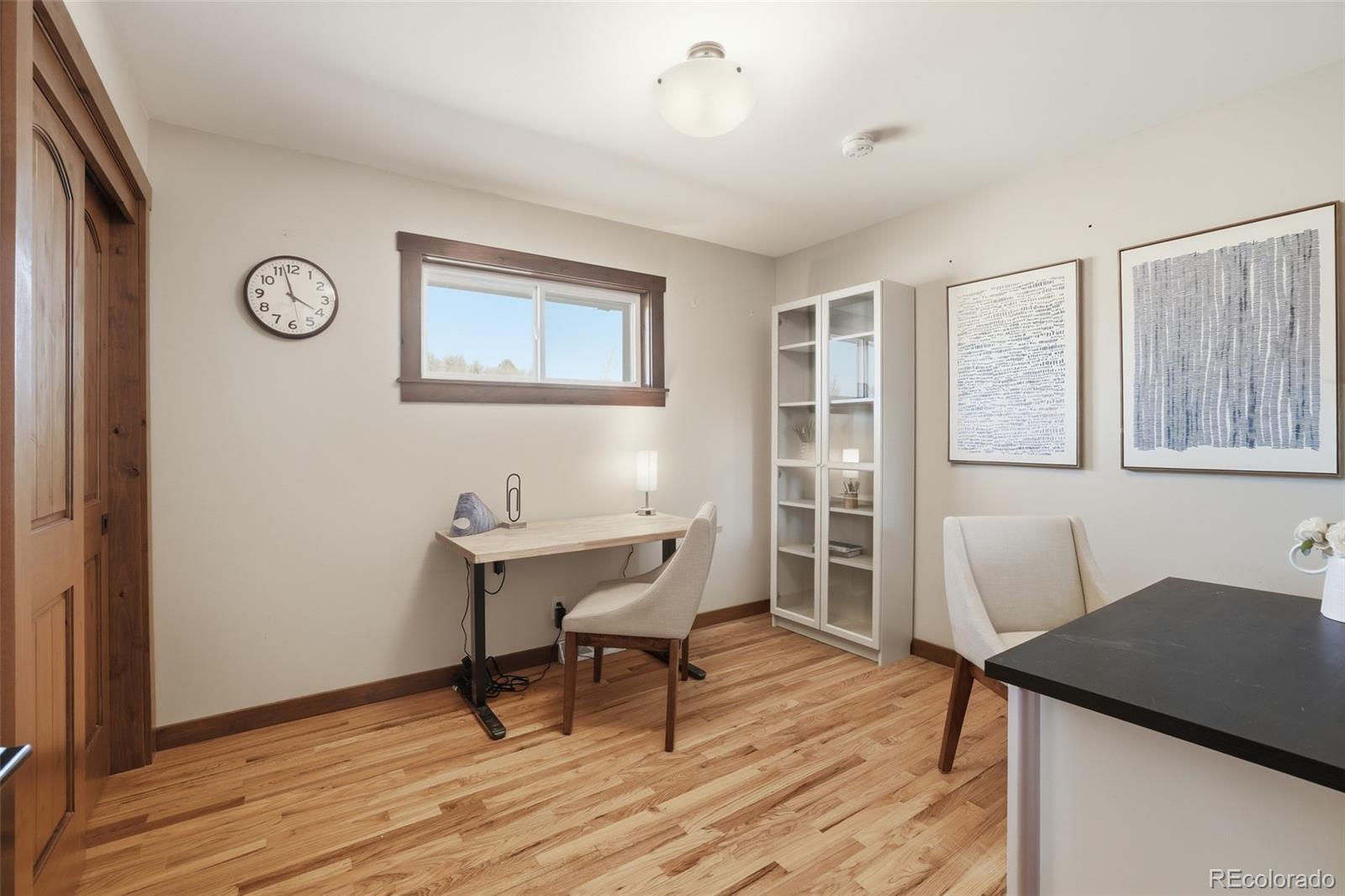2097 West Wolfensberger Road Castle Rock, CO 80109 - Photo 24 of 48 a workspace with wooden floor