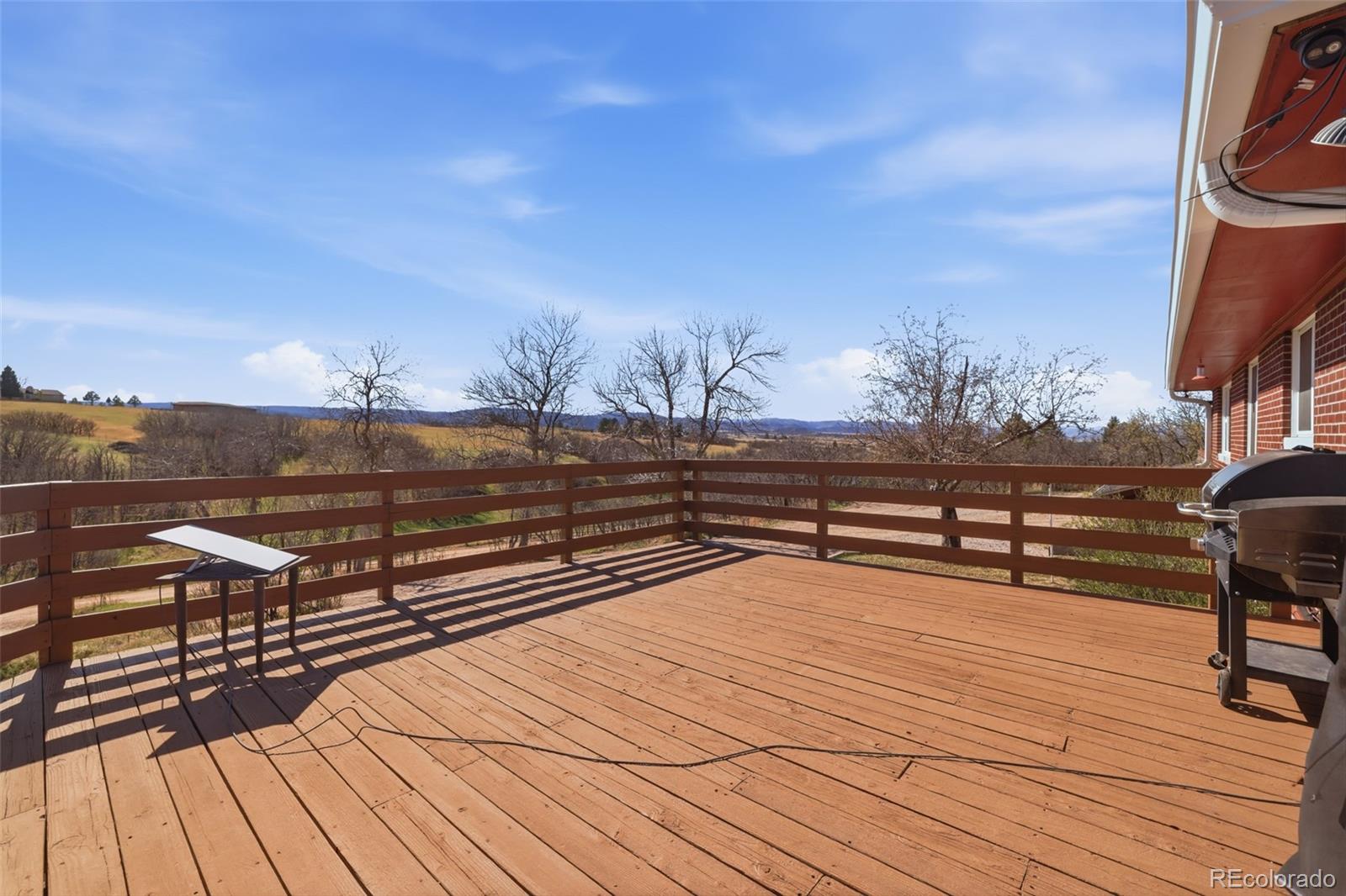 2097 West Wolfensberger Road Castle Rock, CO 80109 - Photo 37 of 48 a view of a terrace with sky view